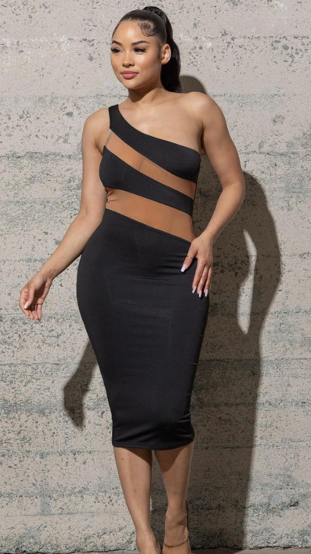 Nude and black dress